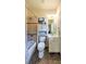 This bathroom has tile floors, a shower/tub, and a vanity with mirror and light fixture at 2043 Mason Mill Rd, Decatur, GA 30033