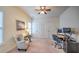 Bedroom with a ceiling fan, a desk with computer and an office chair at 2043 Mason Mill Rd, Decatur, GA 30033