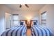 Bedroom with two beds, neutral walls, and a ceiling fan at 2043 Mason Mill Rd, Decatur, GA 30033