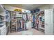 A walk-in closet with custom organizers, shelving, drawers, and hanging racks at 2043 Mason Mill Rd, Decatur, GA 30033