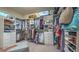 Organized walk-in closet with ample shelving and hanging space for clothes and accessories at 2043 Mason Mill Rd, Decatur, GA 30033