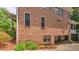 Brick home exterior with attached garage and green landscaping at 2043 Mason Mill Rd, Decatur, GA 30033