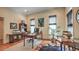 Cozy home office featuring built-in shelving, a desk, and natural light from multiple windows at 2043 Mason Mill Rd, Decatur, GA 30033