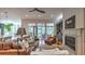 Inviting living space with hardwood floors, fireplace, built-ins, and access to outdoor living at 2043 Mason Mill Rd, Decatur, GA 30033