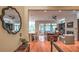 Open concept living room featuring hardwood floors, built-in bookcases, and views of outdoor seating at 2043 Mason Mill Rd, Decatur, GA 30033