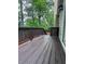 Wood deck extends to home's exterior offering cozy space for outdoor relaxation at 2160 Towne Manor Nw Dr, Kennesaw, GA 30144