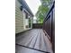 Wood deck extends to home's exterior offering cozy space for outdoor relaxation at 2160 Towne Manor Nw Dr, Kennesaw, GA 30144
