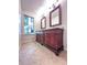 Bathroom featuring double sinks with vanity and stylish tile floors at 2160 Towne Manor Nw Dr, Kennesaw, GA 30144