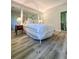 Bedroom features stylish flooring and ensuite bathroom at 2160 Towne Manor Nw Dr, Kennesaw, GA 30144