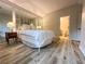 Cozy bedroom features stylish flooring and ensuite bathroom at 2160 Towne Manor Nw Dr, Kennesaw, GA 30144