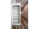 Built-in shelving near entryway featuring modern flooring at 2160 Towne Manor Nw Dr, Kennesaw, GA 30144