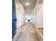 Light filled foyer featuring hardwood floors and a view of the living room with fireplace at 2160 Towne Manor Nw Dr, Kennesaw, GA 30144