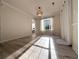 Bright living room with wood floors, natural light, and access to the outside at 2160 Towne Manor Nw Dr, Kennesaw, GA 30144