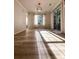 Bright living room with wood floors, natural light, and access to the outside at 2160 Towne Manor Nw Dr, Kennesaw, GA 30144