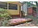 Backyard view of a small wooden deck, siding, and a glimpse of the neighboring house at 4120 Buckley Woods Dr, Norcross, GA 30093