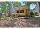 View of the property's backyard, the house, and the adjacent neighborhood at 4120 Buckley Woods Dr, Norcross, GA 30093