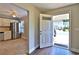 Inviting entryway with hardwood floors, flowing into the kitchen featuring stainless steel appliances at 4120 Buckley Woods Dr, Norcross, GA 30093