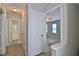 Neutral hallway featuring carpet floors, white doors and trim, and an open doorway to a bedroom at 4120 Buckley Woods Dr, Norcross, GA 30093