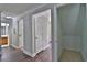 Hallway leads to kitchen, bathroom, and utility closet at 4120 Buckley Woods Dr, Norcross, GA 30093