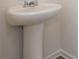 Close up of a clean white pedestal sink at 174 Bloomfield Cir, Canton, GA 30114