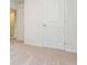 A bright bedroom with a plush carpet and a closet at 174 Bloomfield Cir, Canton, GA 30114
