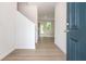 Entryway with hardwood floors, leading into an open floor plan with lots of natural light at 174 Bloomfield Cir, Canton, GA 30114