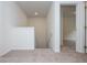 Bright hallway featuring neutral carpet and white trim and doors at 174 Bloomfield Cir, Canton, GA 30114
