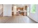 View of open kitchen featuring an island, stainless appliances, and granite counters at 174 Bloomfield Cir, Canton, GA 30114