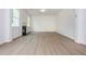 Living room with hardwood floors, lots of natural light, and a gas fireplace at 174 Bloomfield Cir, Canton, GA 30114