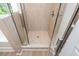 Modern shower with tile walls and a glass door at 174 Bloomfield Cir, Canton, GA 30114
