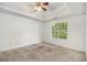 Bedroom with tray ceiling and natural light; a serene retreat at 3694 Arrowhead Pl, Douglasville, GA 30135
