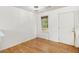Bedroom featuring natural light, a window with a view, and an access door at 3694 Arrowhead Pl, Douglasville, GA 30135