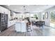 Spacious kitchen with a large island, stainless steel appliances, and an adjacent dining area at 5121 Hillside Haven Drive, Powder Springs, GA 30127