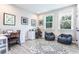 Functional home office with two desks, natural light, and comfortable seating at 5121 Hillside Haven Drive, Powder Springs, GA 30127
