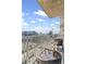 Enjoy city views from this condo's balcony featuring comfortable seating, a modern design, and a great place to relax at 860 Peachtree Ne St # 1712, Atlanta, GA 30308