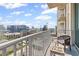 Balcony featuring a chair, table, and a stunning view of the city skyline at 860 Peachtree Ne St # 1712, Atlanta, GA 30308
