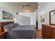 Comfortable bedroom space with a modern bed, minimalist decor, and natural light, offering a cozy retreat at 860 Peachtree Ne St # 1712, Atlanta, GA 30308