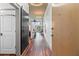 A modern condo entrance featuring a sliding barn door and hardwood floors at 860 Peachtree Ne St # 1712, Atlanta, GA 30308