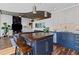 Open-concept kitchen with an island connecting to the living area, showcasing modern design and open living at 860 Peachtree Ne St # 1712, Atlanta, GA 30308