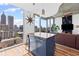 Bright living space with city views, featuring modern decor, a comfortable seating area, and natural light at 860 Peachtree Ne St # 1712, Atlanta, GA 30308