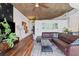 Spacious living room, adjacent to the kitchen and featuring a concrete ceiling at 860 Peachtree Ne St # 1712, Atlanta, GA 30308
