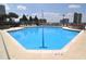 Rooftop pool with lounge chairs and city views at 860 Peachtree Ne St # 1712, Atlanta, GA 30308