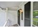 Inviting front entrance featuring a classic door, decorative wreath, and stylish house numbers at 1118 Creekdale Dr, Clarkston, GA 30021