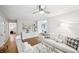 Cozy living room with hardwood floors, stylish decor, and ample natural light at 1118 Creekdale Dr, Clarkston, GA 30021