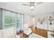 Living room with hardwood floors, large window, modern decor, and comfortable seating at 1118 Creekdale Dr, Clarkston, GA 30021