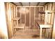 Interior view of the shed with well-organized shelving and ample space for storage and projects at 1118 Creekdale Dr, Clarkston, GA 30021