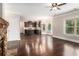 Bright, open-concept living space connecting to the kitchen with views of backyard at 4910 Bucknell Trce, Cumming, GA 30028