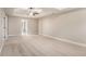 Large main bedroom offers a tray ceiling, neutral paint and soft carpeting at 4910 Bucknell Trce, Cumming, GA 30028