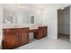 Bathroom with a large soaking tub, a walk-in shower, double sink vanity and a walk-in closet at 7280 Wright Dr, Atlanta, GA 30349