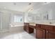 Bathroom with a large soaking tub, a walk-in shower, double sink vanity with ample counter space at 7280 Wright Dr, Atlanta, GA 30349
